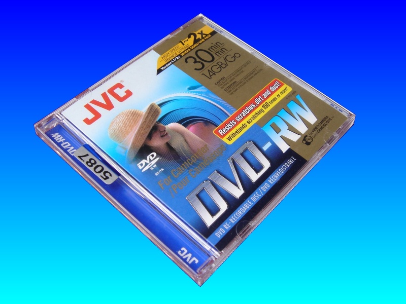 A photo of the very popular JVC DVD-RW mini dvd disk. This one was used in an Hitachi camcorder and needed the movie recovering off it. The DVD is shown still in it's protective plastic case.
