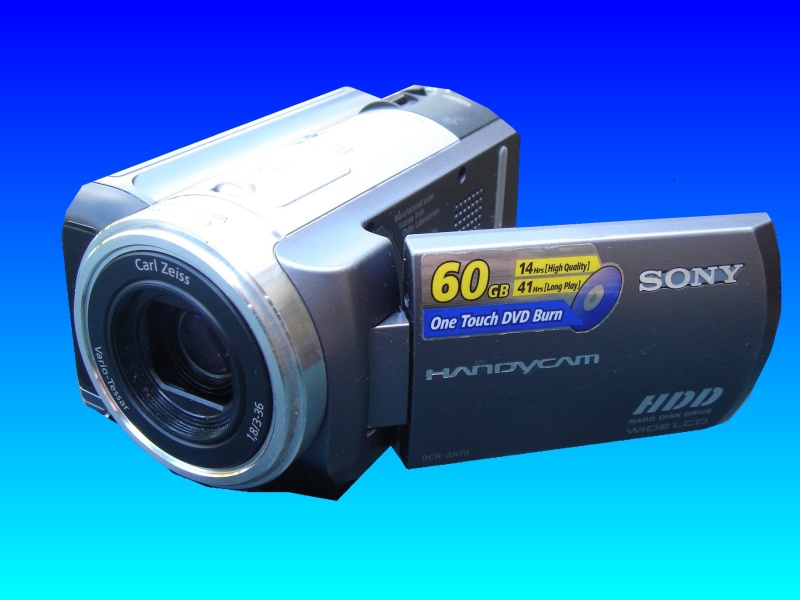 A Sony Handycam HDD model number DCR-SR70 which the owner accidentally deleted all the images of the video clips. The lcd display screen is shown slightly open.