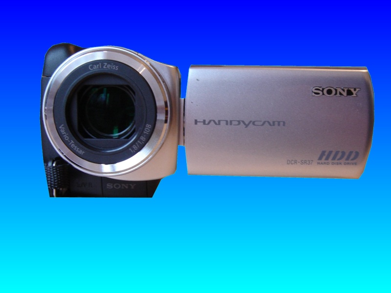 A Sony Handycam DCR-SR32E which required videos retrieved from the camera after it was accidentally reformatted by the owner. The camera is shown looking head on to the lense with the LCD screen open.
