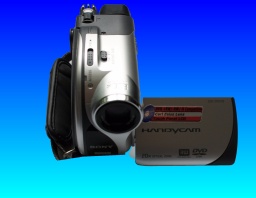 A Sony DCR-DVD105E Handycam viewed from above with it's display screen opened.