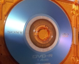 A Sony Mini DVD-R inside it's jewel case. This DVD was sent from East Syracuse, USA, where it had been used to record a friend's wedding video. The disc was used in a Sony Handycam and held 4 clips of the event, but was apprently corrupt and would only playback 2 of the clips. 